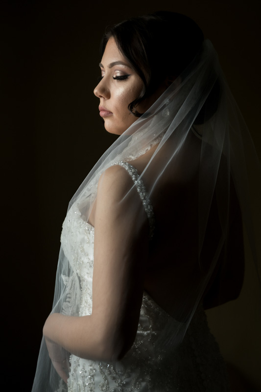 Bride backside shot with eyes closed