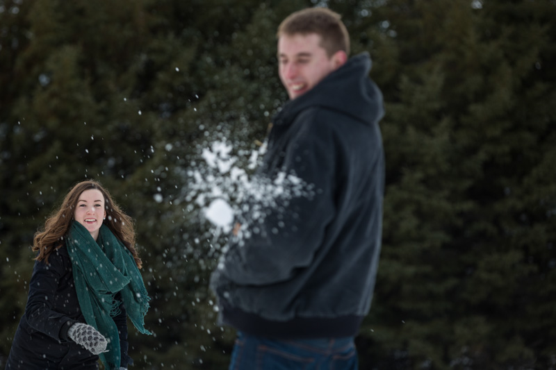 Throwing snow balls into each other