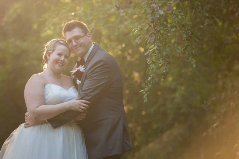 Romantic couple during sunset in park