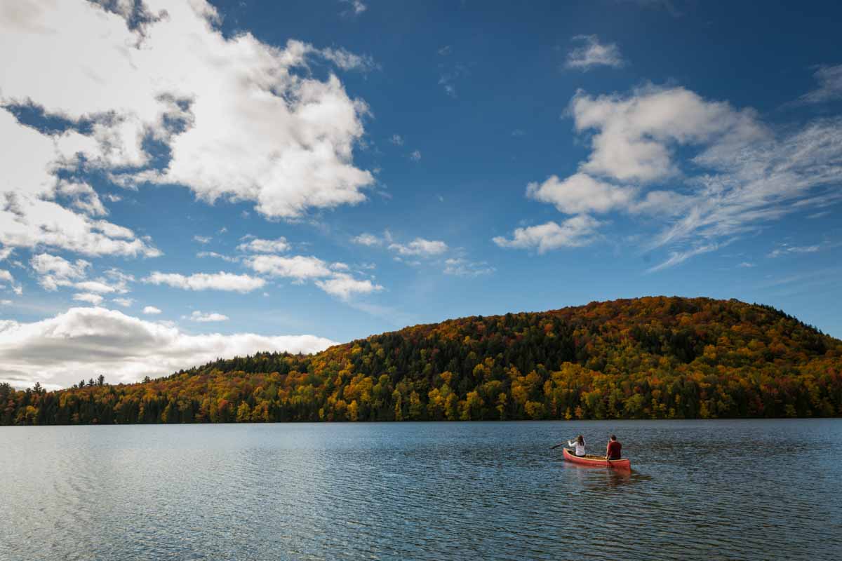 Mountain view with kayak on lake