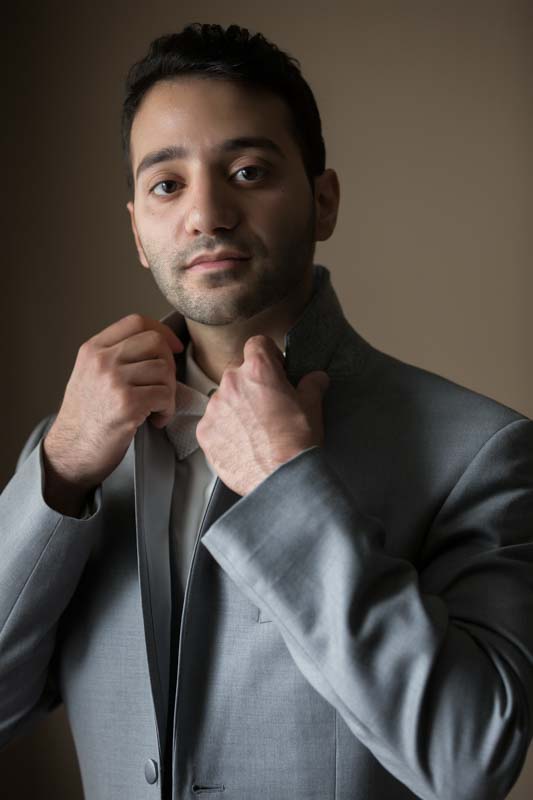 Groom holding collar